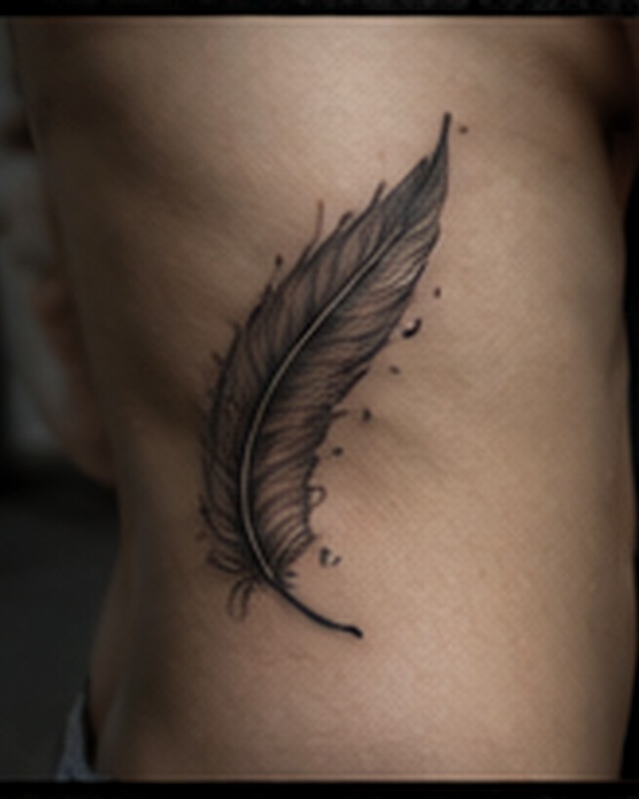Fine line feather tattoo